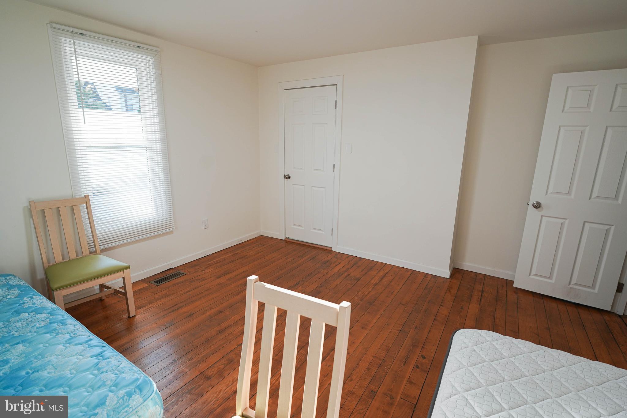 231 Newton Street, Unit A Salisbury, MD 21801 - Photo 24 of 38 a view of a room with wooden floor and a window