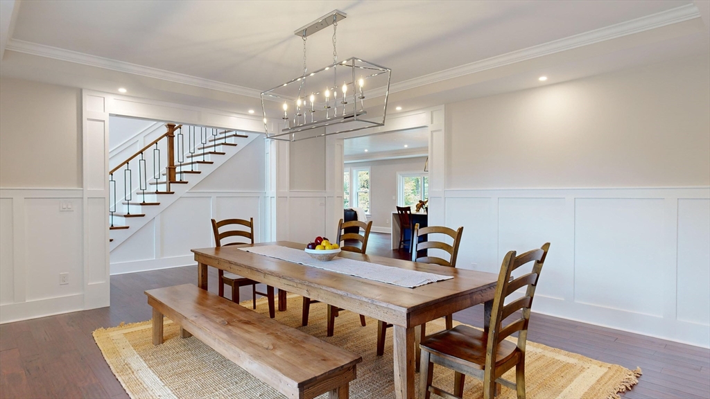 8 Charles Street North Reading, MA 01864 - Photo 12 of 42 a view of a dining room with furniture and wooden floor