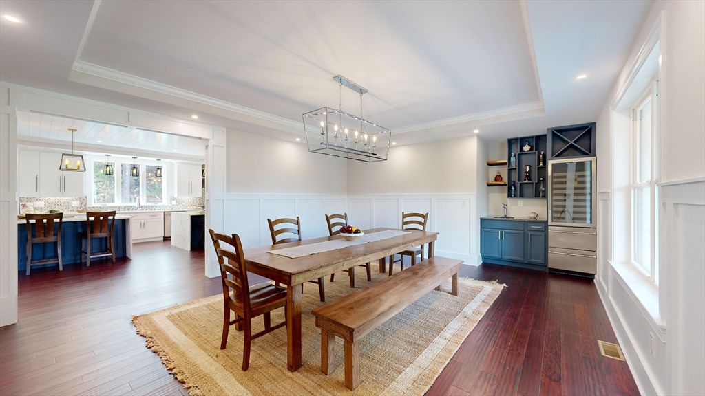 8 Charles Street North Reading, MA 01864 - Photo 14 of 42 a view of a dining room with furniture and wooden floor