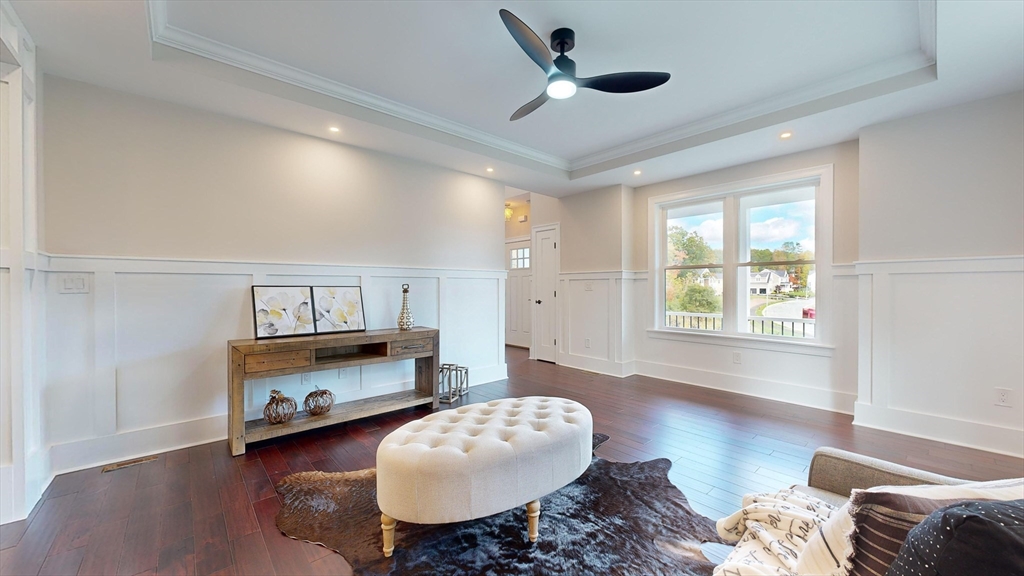 8 Charles Street North Reading, MA 01864 - Photo 15 of 42 a living room with furniture and a wooden floor