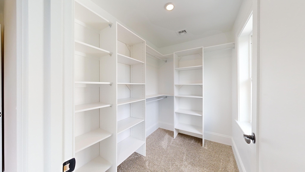 8 Charles Street North Reading, MA 01864 - Photo 27 of 42 a view of an empty walk in closet