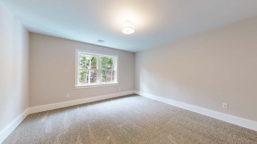 8 Charles Street North Reading, MA 01864 - Photo 29 of 42 an empty room with a window