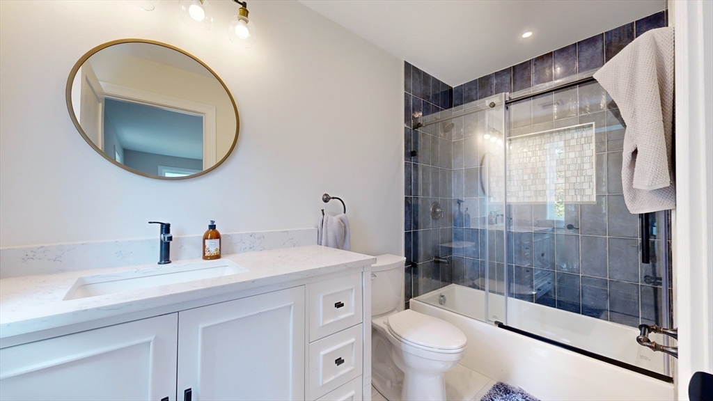 8 Charles Street North Reading, MA 01864 - Photo 34 of 42 a bathroom with a sink a toilet and shower