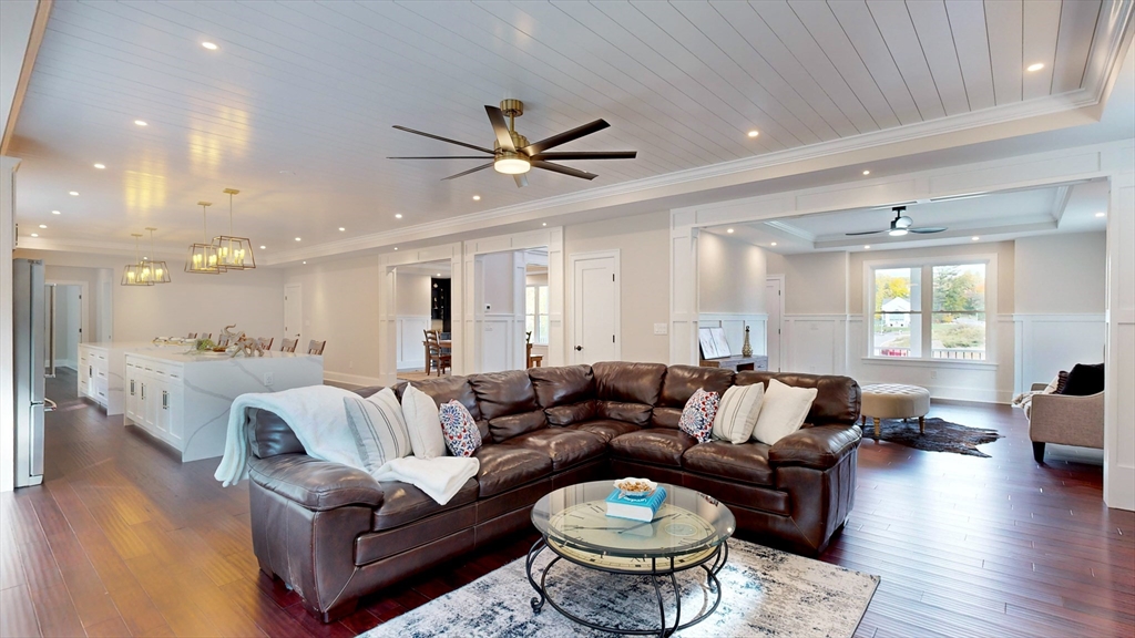 8 Charles Street North Reading, MA 01864 - Photo 10 of 42 a living room with furniture and a wooden floor