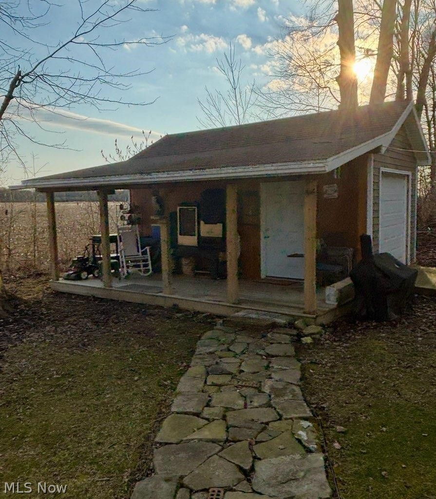 889 Long Shadow Lane Rome, OH 44085 - Photo 3 of 49 Cute 20x12 Shed with a shaded porch