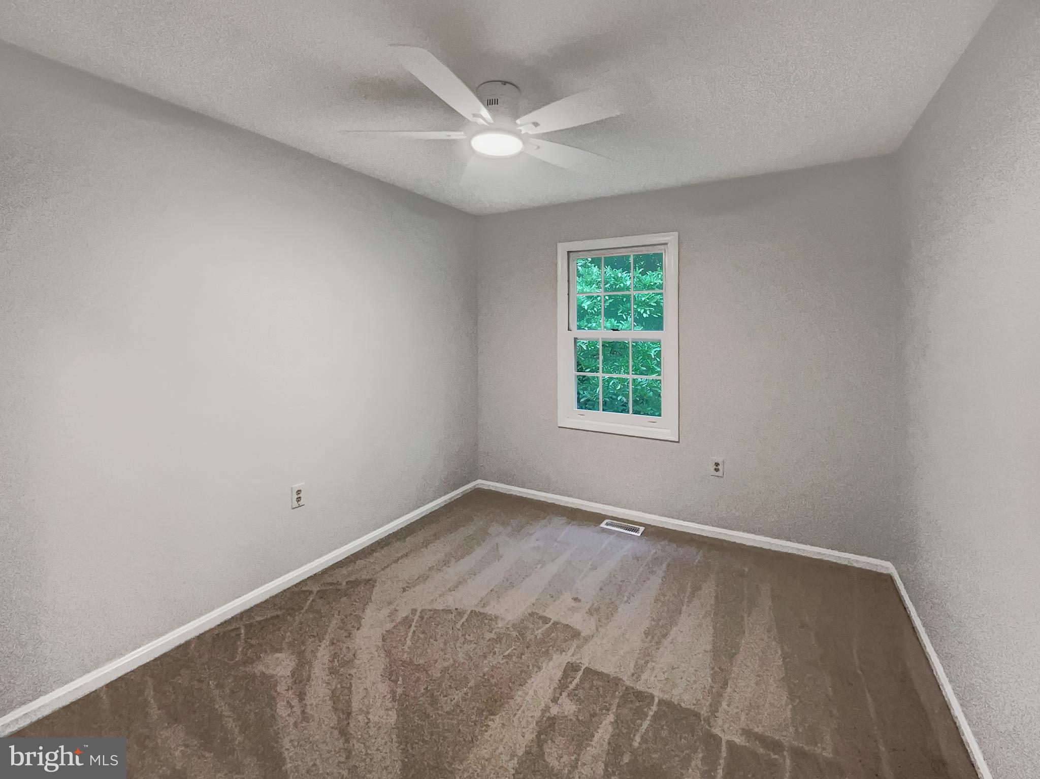 13109 Mica Court Silver Spring, MD 20904 - Photo 15 of 25 an empty room with a window
