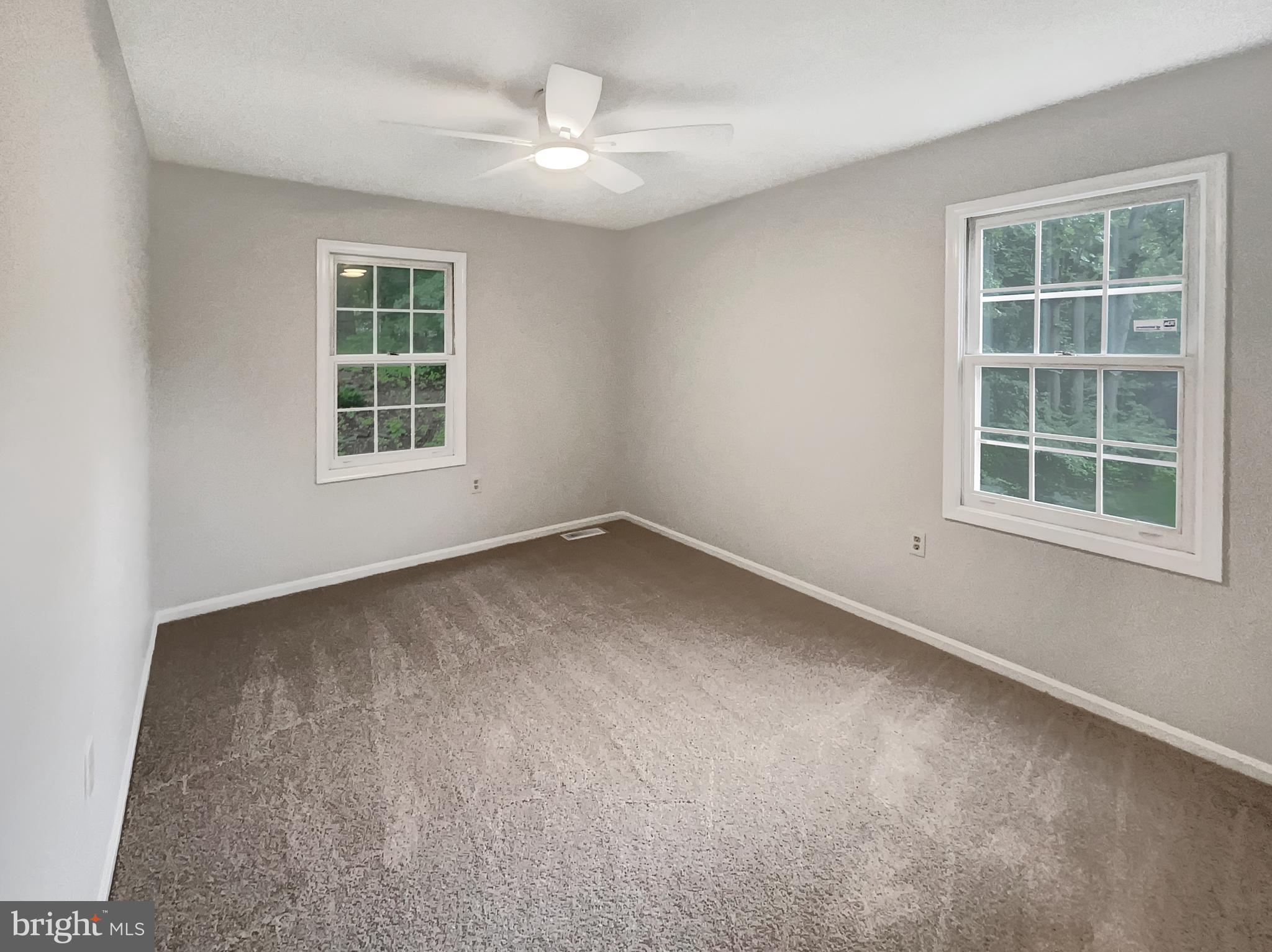 13109 Mica Court Silver Spring, MD 20904 - Photo 5 of 25 an empty room with a window