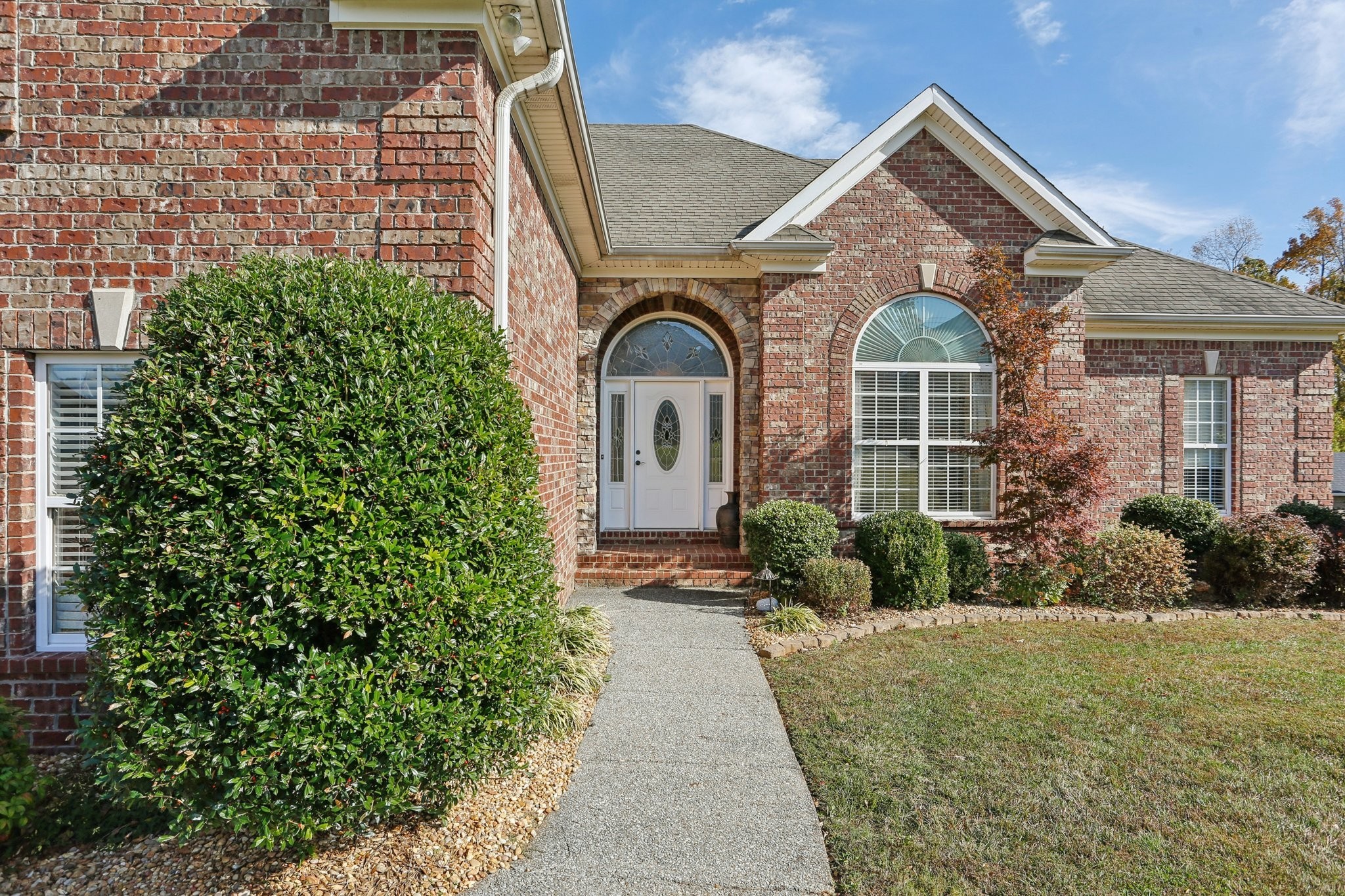 4015 Pilgrim Trail Greenbrier, TN 37073 - Photo 6 of 76 a front view of a house with garden