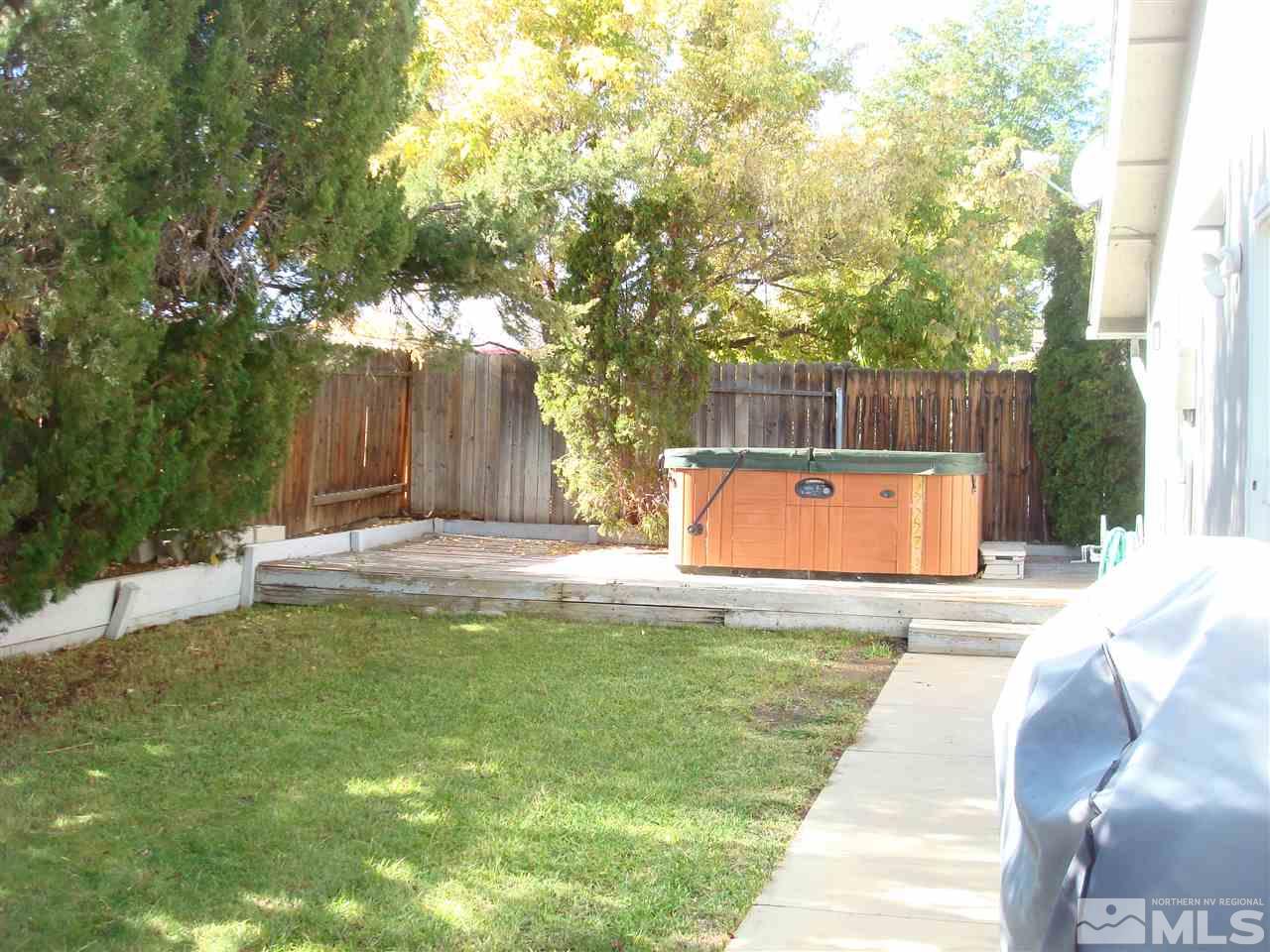 6234 Chesterfield Lane Reno, NV 89523 - Photo 3 of 11 a swimming pool with outdoor seating and yard