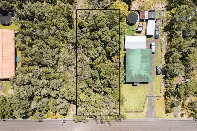 a view of a house with a tree
