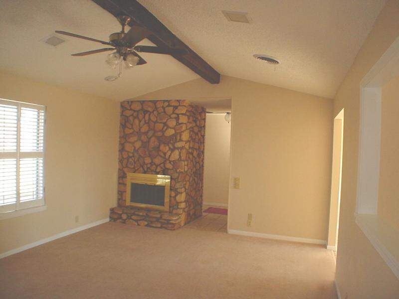 4315 Arden Road Amarillo, TX 79110 - Photo 2 of 11 an empty room with windows and closet