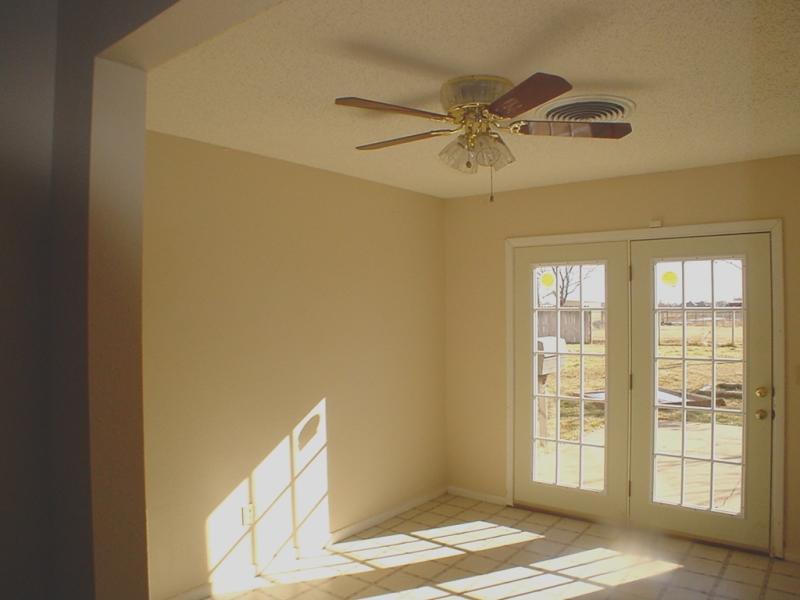 4315 Arden Road Amarillo, TX 79110 - Photo 3 of 11 a view of an empty room with a window