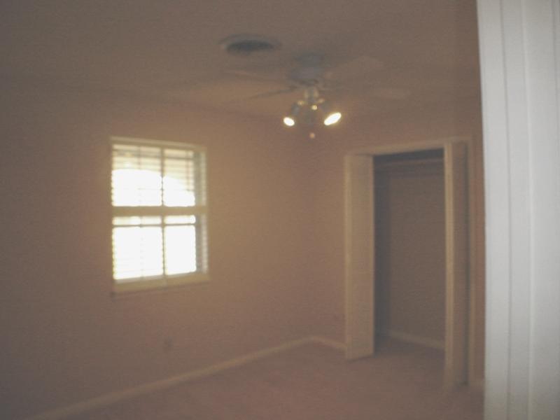 4315 Arden Road Amarillo, TX 79110 - Photo 7 of 11 a view of an empty room with a window