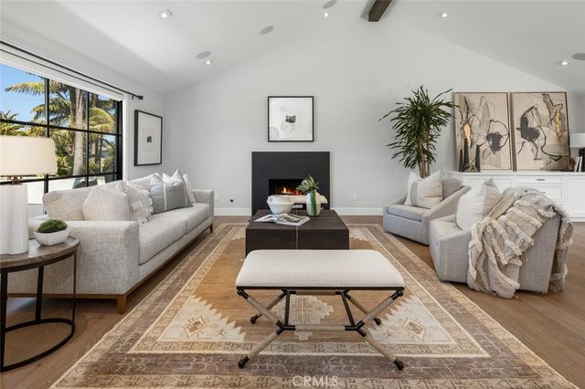 a living room with furniture and window