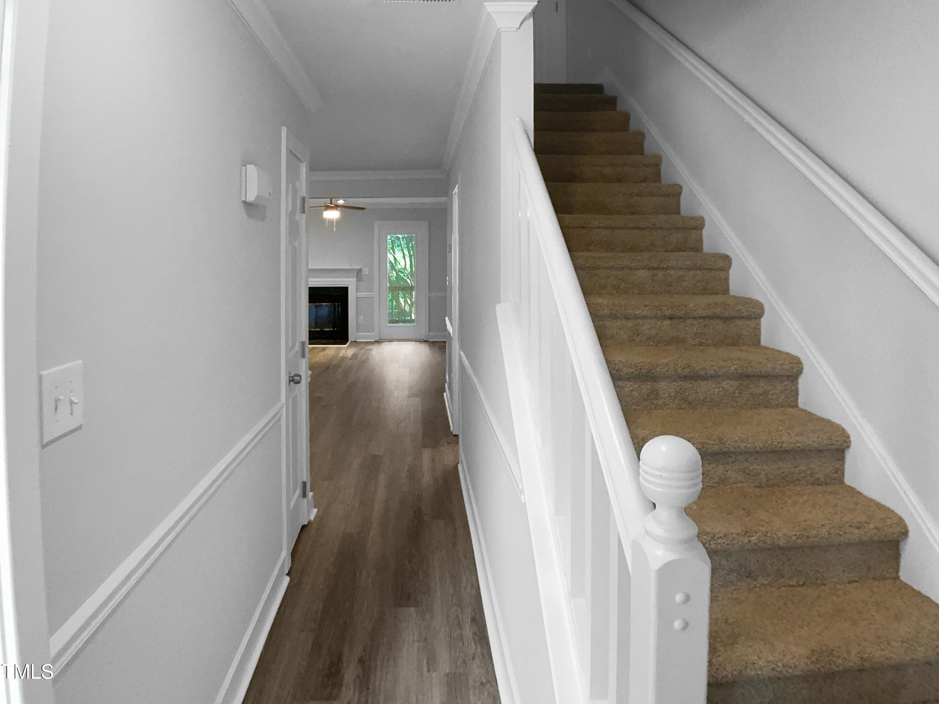 1432 Quarter Point Raleigh, NC 27615 - Photo 11 of 25 a view of entryway and hall with wooden floor