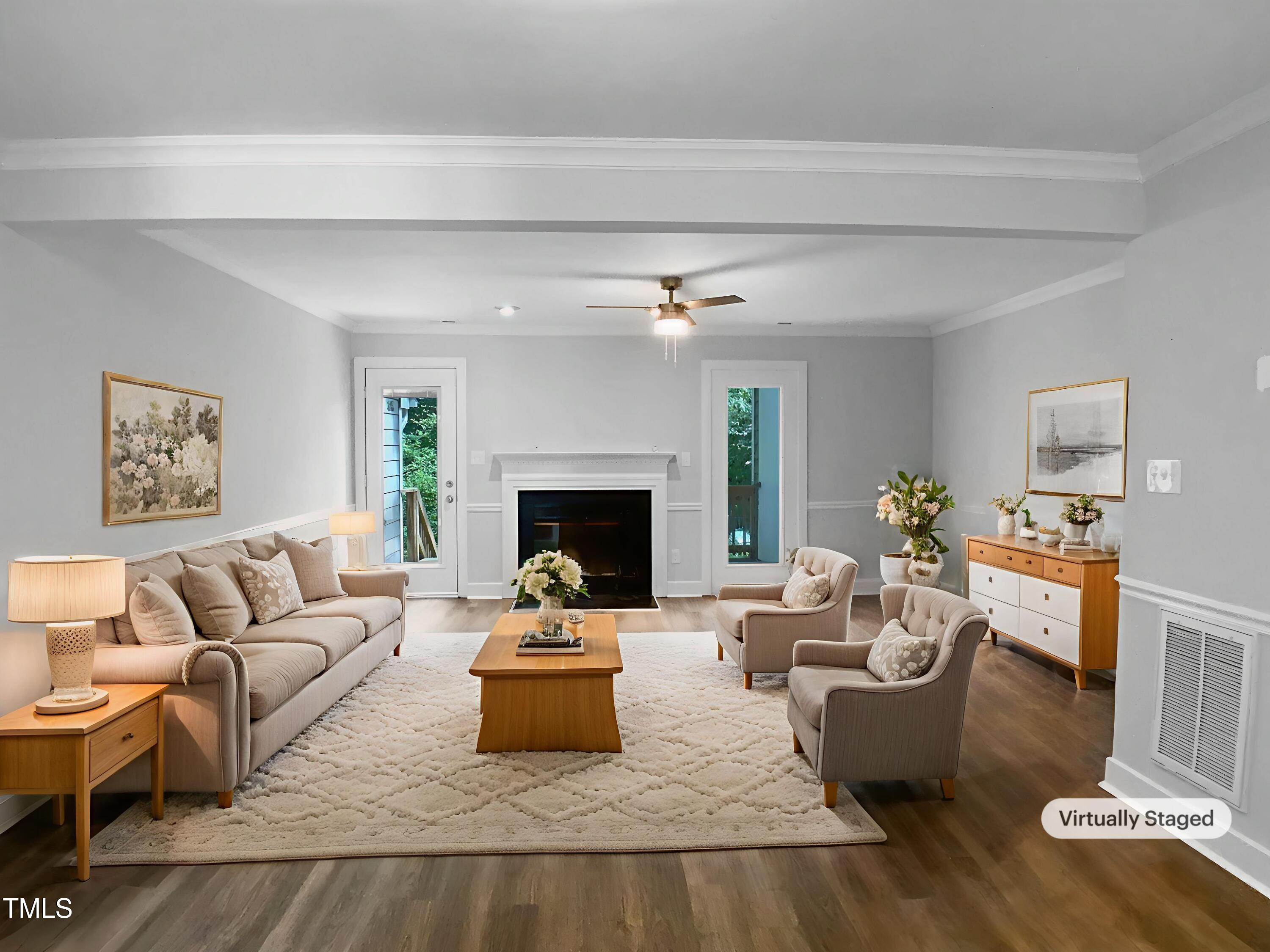 1432 Quarter Point Raleigh, NC 27615 - Photo 2 of 25 a living room with furniture and a fireplace