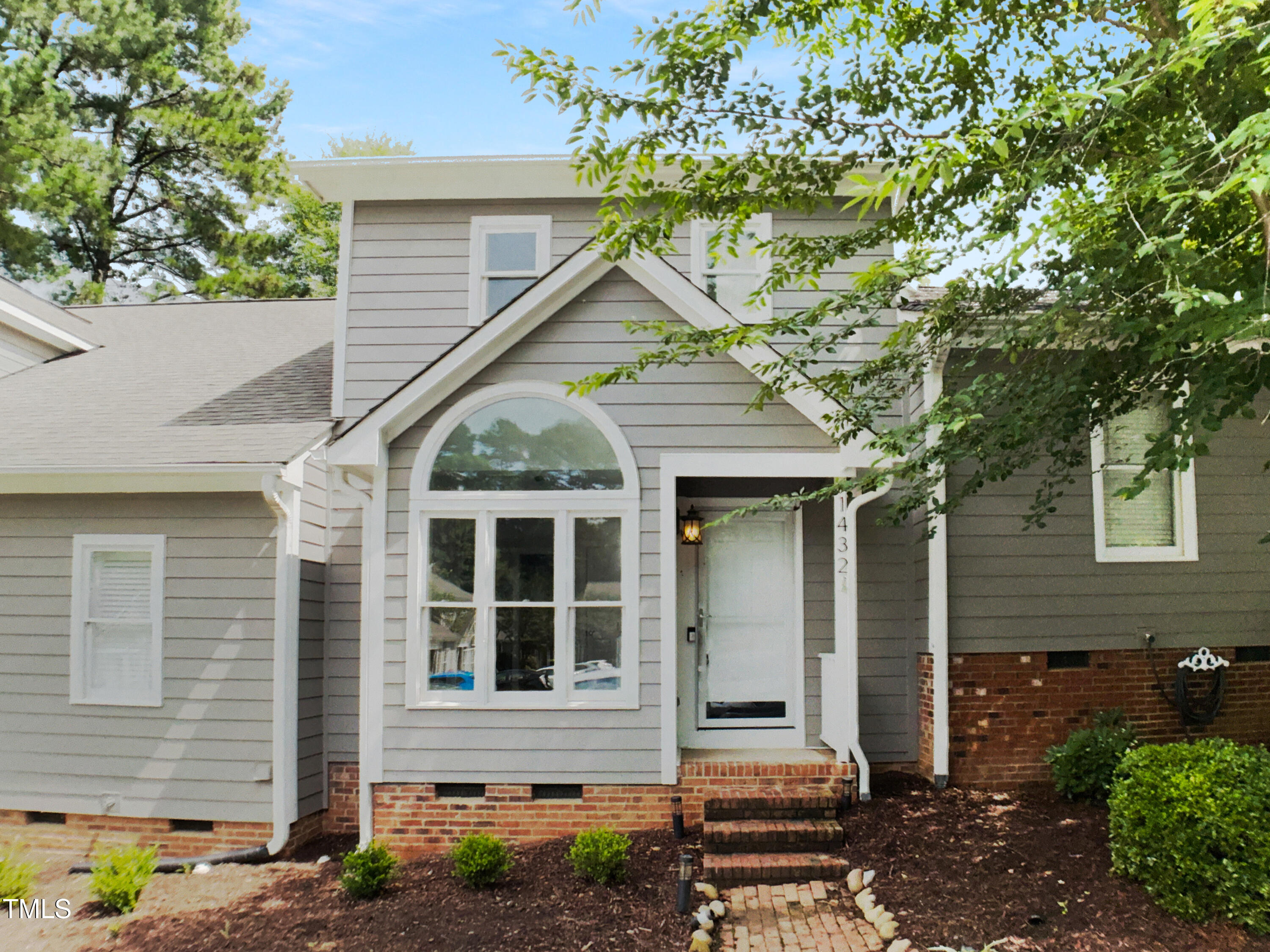 1432 Quarter Point Raleigh, NC 27615 - Photo 25 of 25 front view of a house with a yard