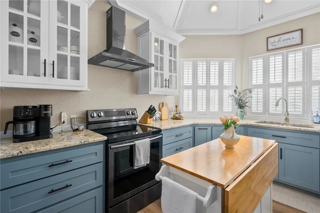 a kitchen with a sink and a window