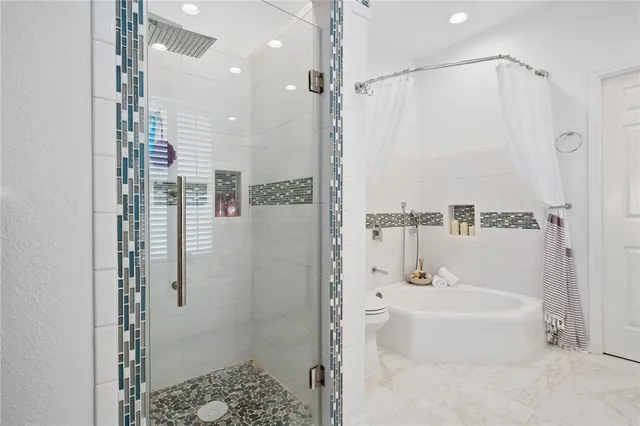 a bathroom with a toilet and a sink