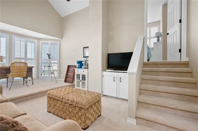 a view of a balcony with furniture