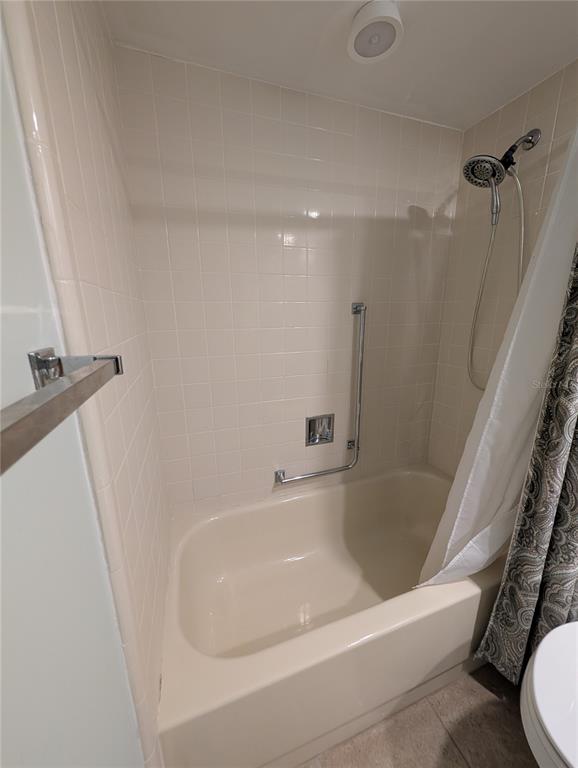 8161 Braddock Circle, Unit 1 Port Richey, FL 34668 - Photo 19 of 27 a close view of a bathtub in bathroom