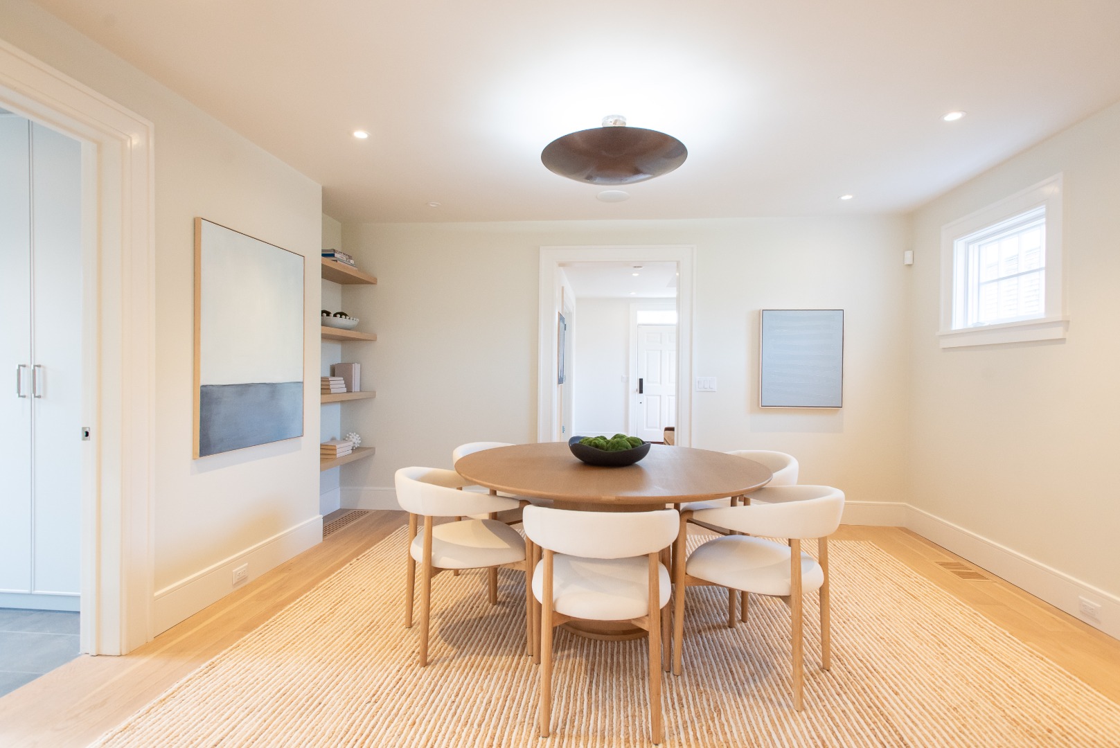10 Silver Street Nantucket, MA 02554 - Photo 13 of 48 a view of a dining room with furniture and wooden floor