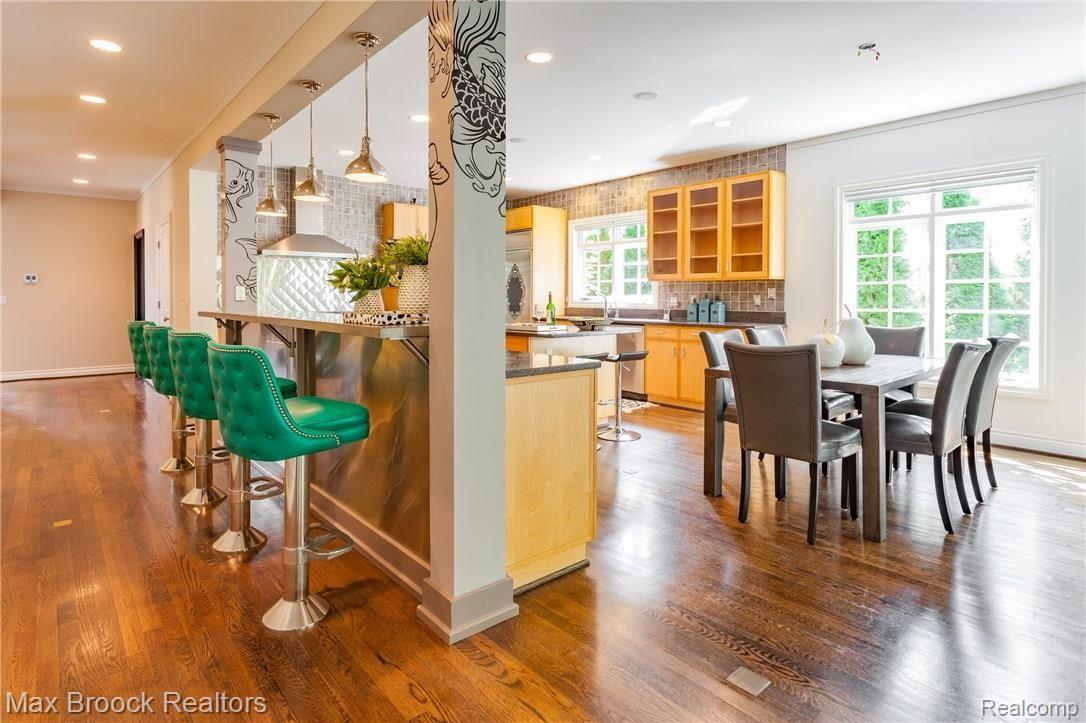 242 Aspen Road Birmingham, MI 48009 - Photo 20 of 55 Built In Custom Counter Stools are a Great Spot for Friends to Gather and Watch the Cook