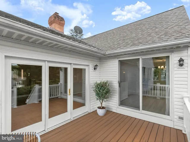 a kitchen with stainless steel appliances granite countertop a sink stove microwave and refrigerator