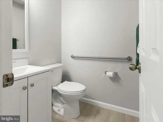 a bathroom with a sink toilet tub and shower