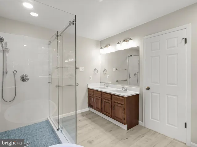 a view of empty room with wooden ceiling