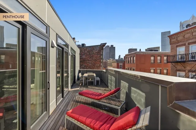 a workspace with furniture and wooden floor