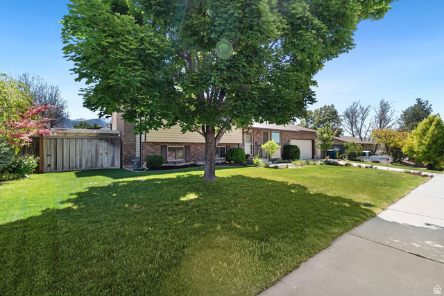 865 South 325 West Orem, UT 84058 - Photo 6 of 38 Spacious front yard with mature tree providing shade