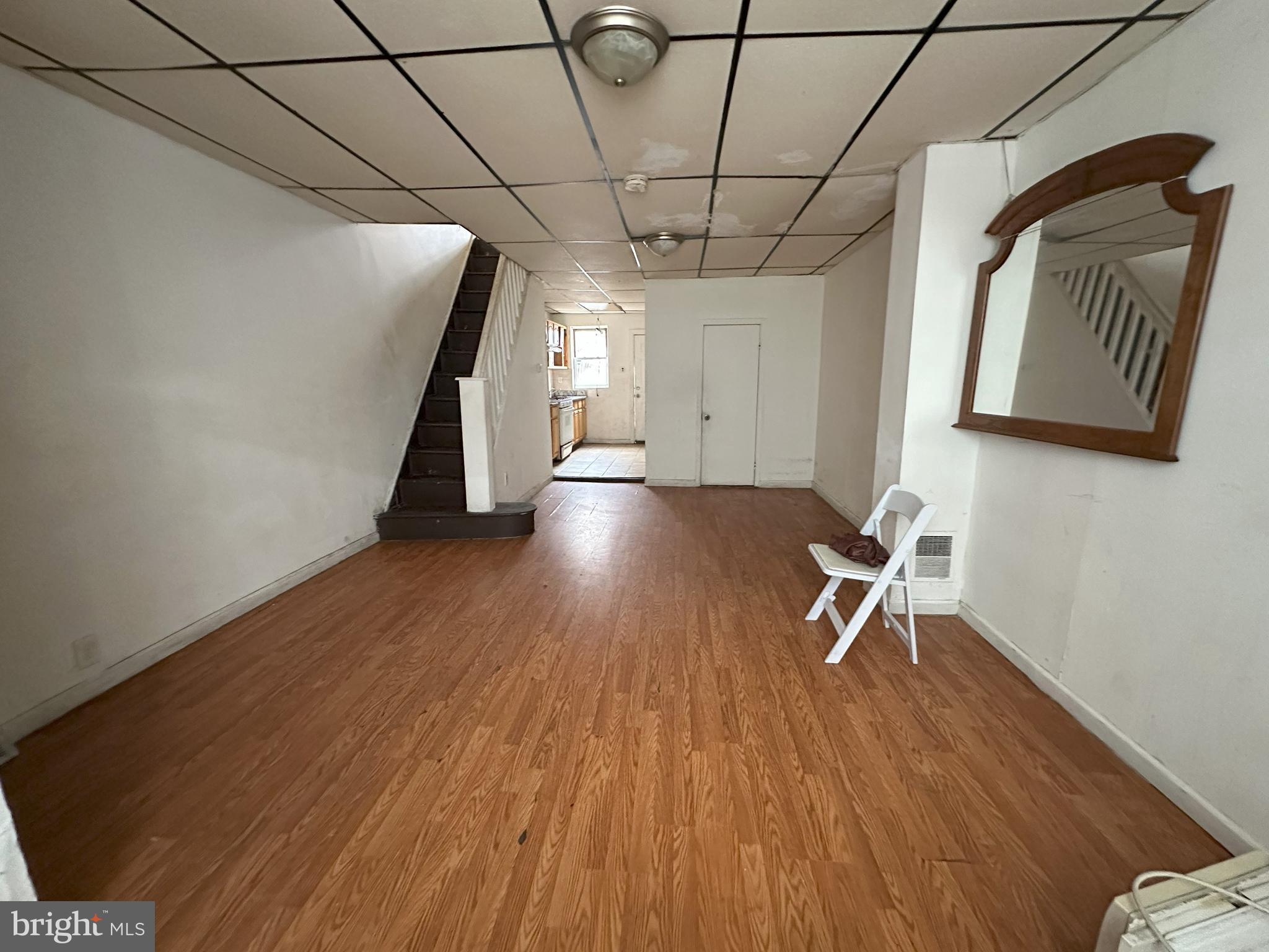 2539 South Marshall Street Philadelphia, PA 19148 - Photo 2 of 13 a view of a livingroom with wooden floor and a hallway