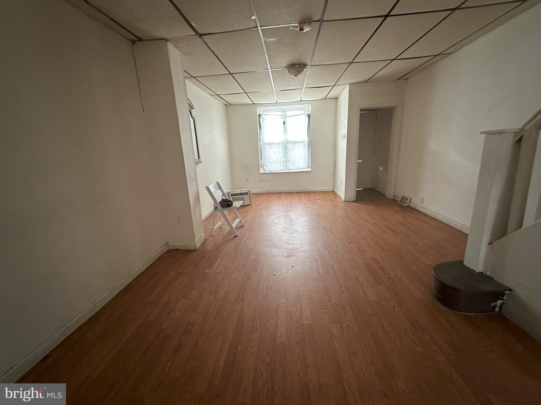 2539 South Marshall Street Philadelphia, PA 19148 - Photo 3 of 13 a view of empty room with wooden floor and fan