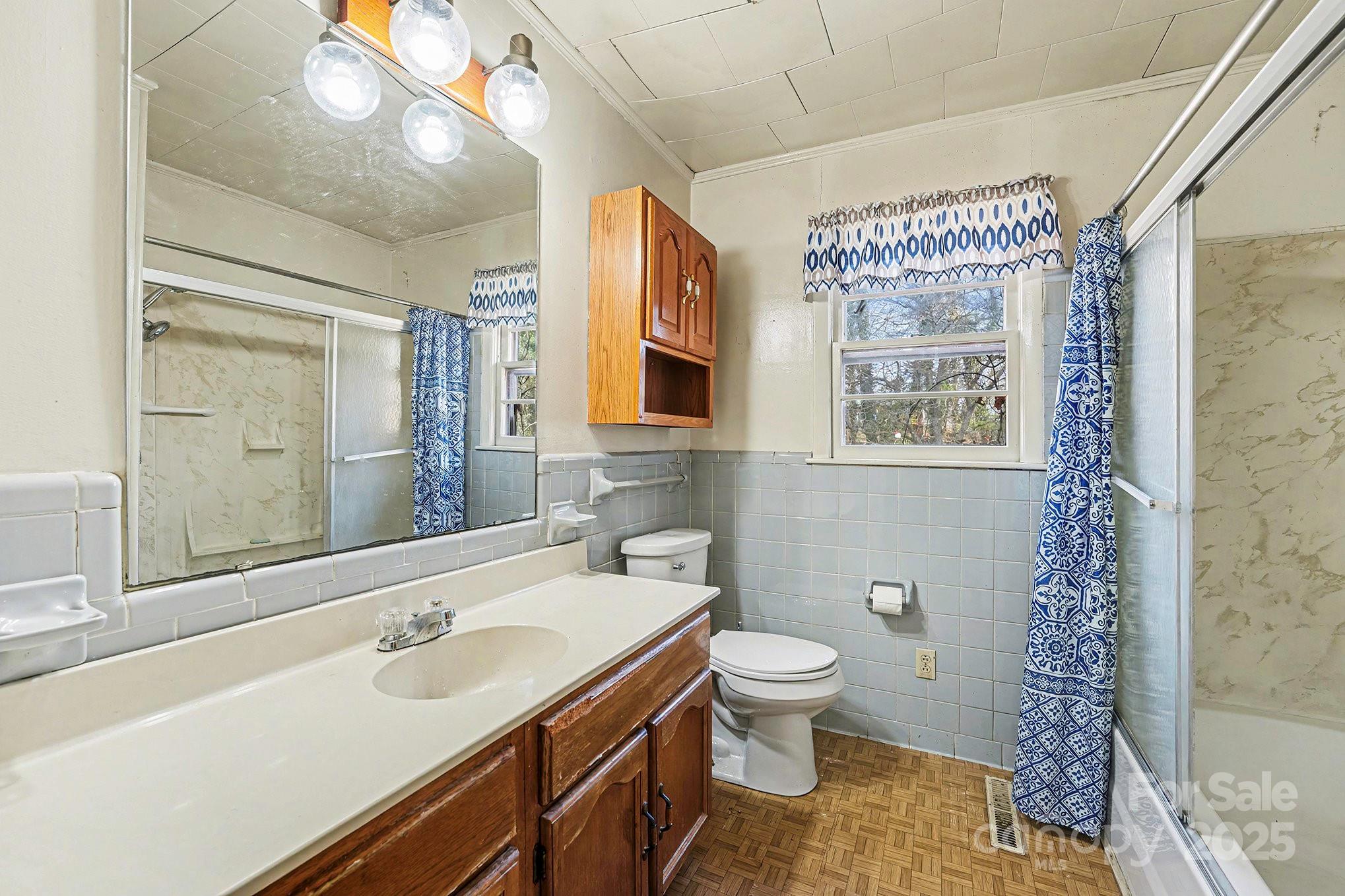 3442 Lester Street Conover, NC 28613 - Photo 17 of 38 a bathroom with a sink toilet and shower
