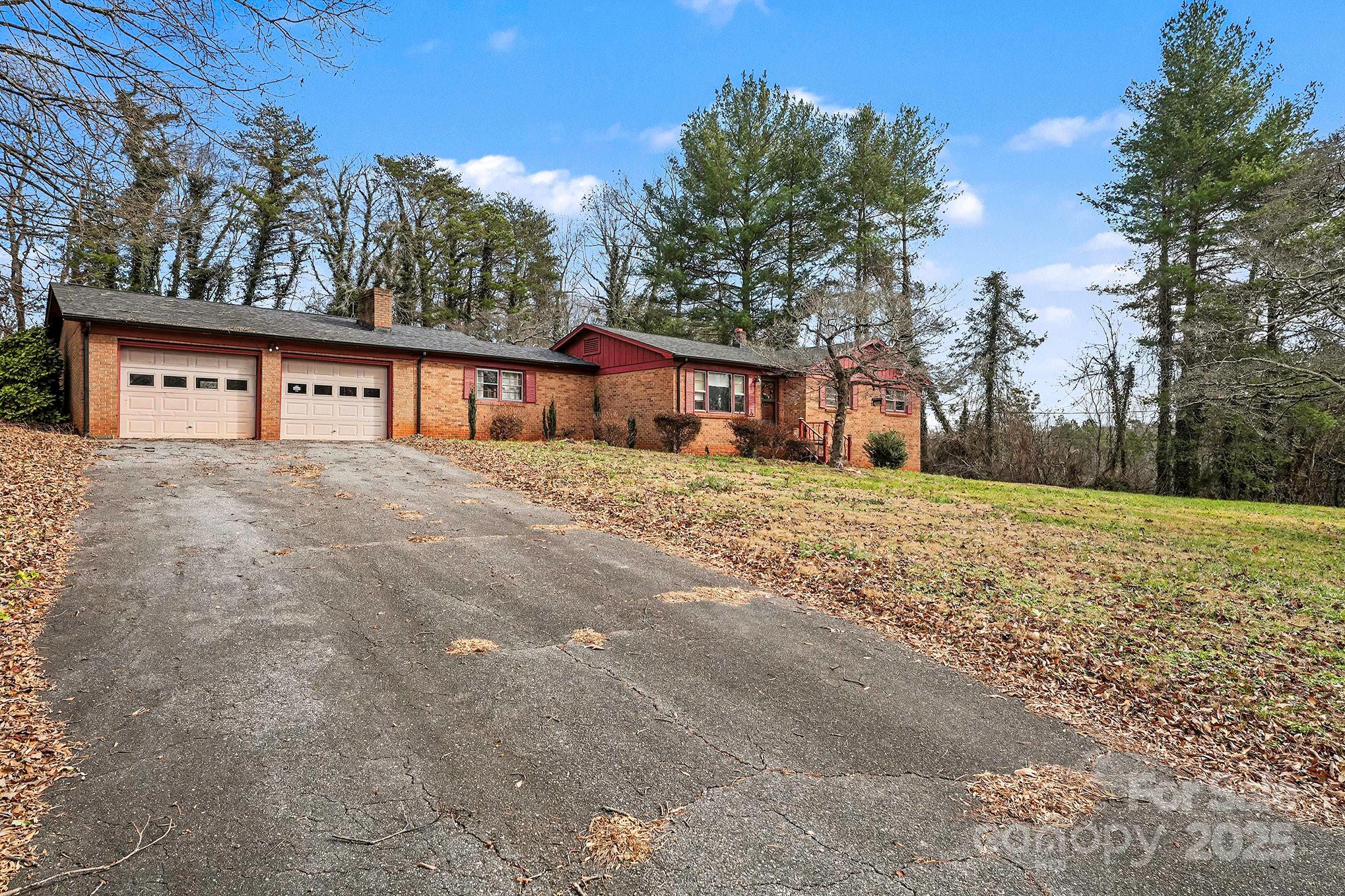 3442 Lester Street Conover, NC 28613 - Photo 2 of 38 a view of a house with a yard