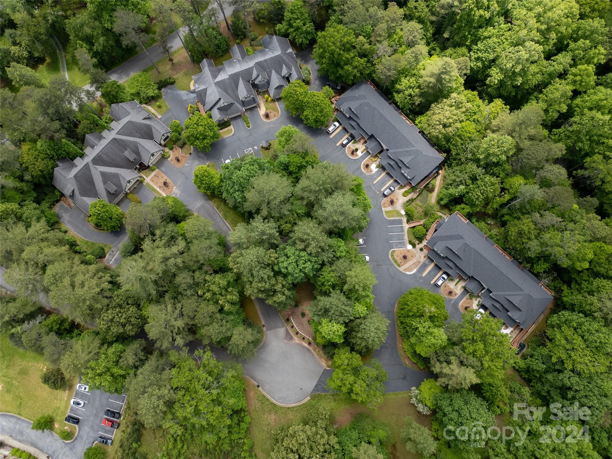 99 Ridgetop Circle, Unit 102 Brevard, NC 28712 - Photo 5 of 36 an aerial view of house with yard
