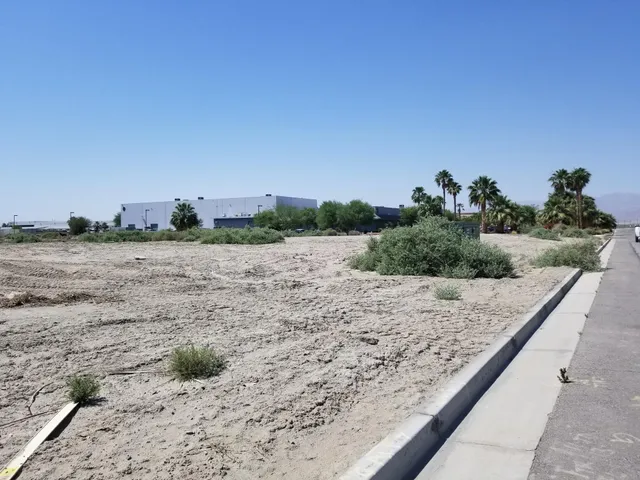 a view of a road with an ocean view