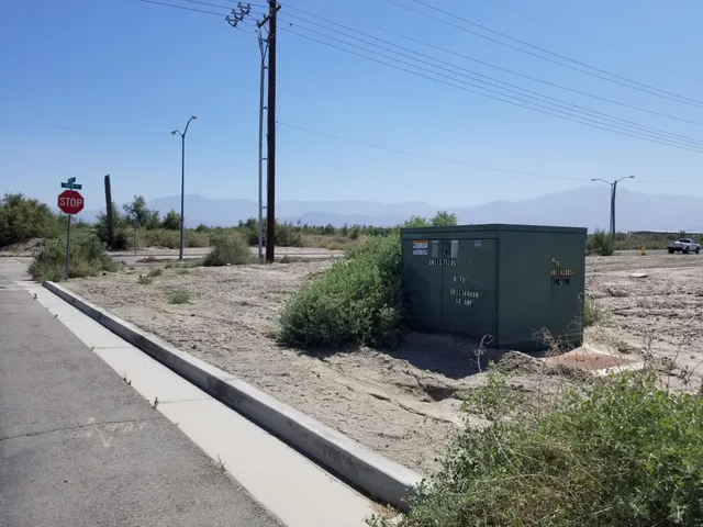 a view of a backyard of water and mountain view