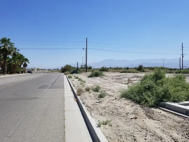 a view of a beach with a lake