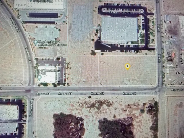 a sign on a pole on a street