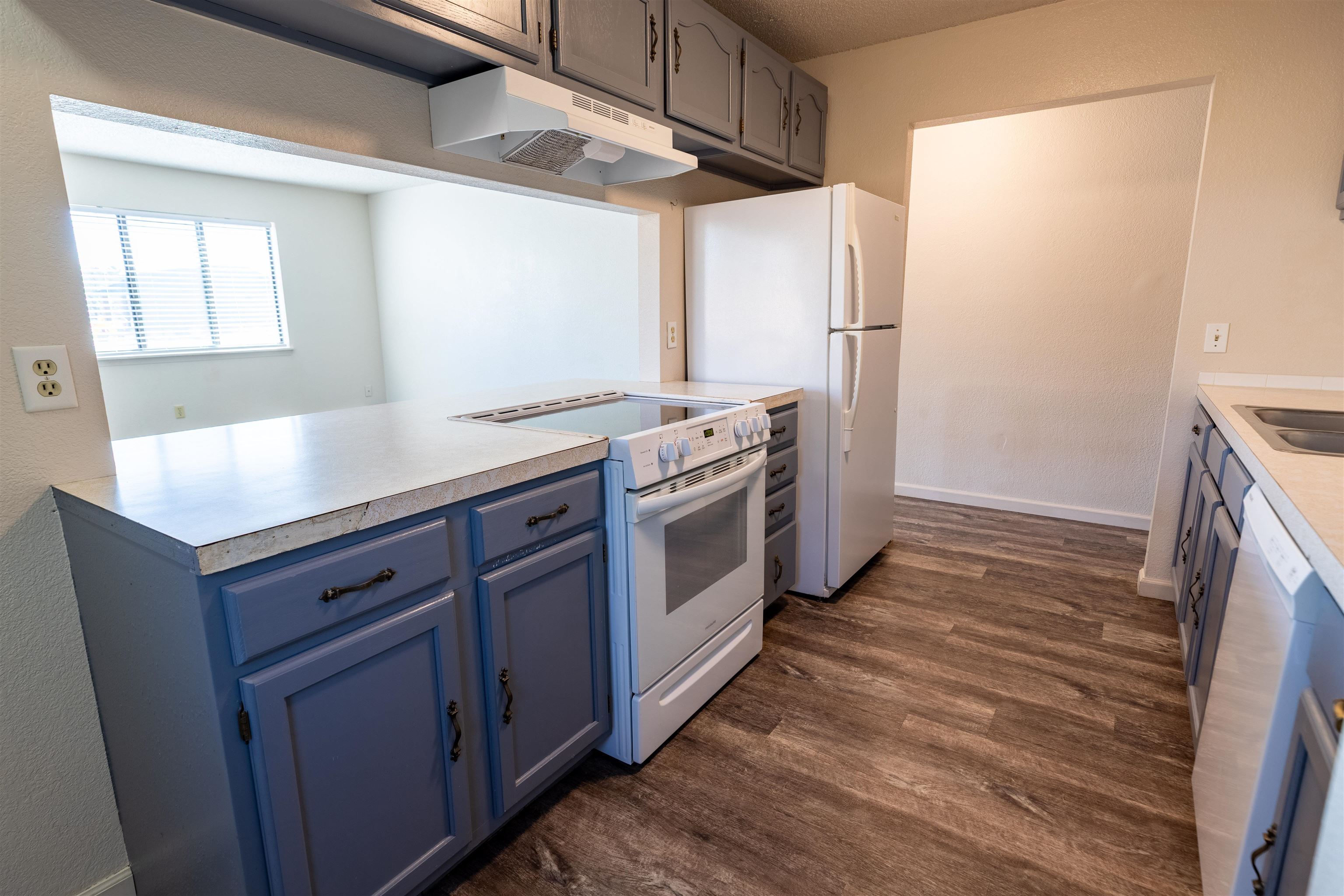 239 South Elm Street, Unit A Fruita, CO 81521 - Photo 7 of 22 a kitchen with a stove oven and sink