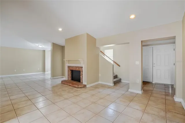 a view of a livingroom with wooden floor