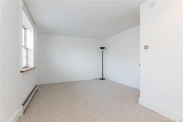 a kitchen with a stove and a refrigerator