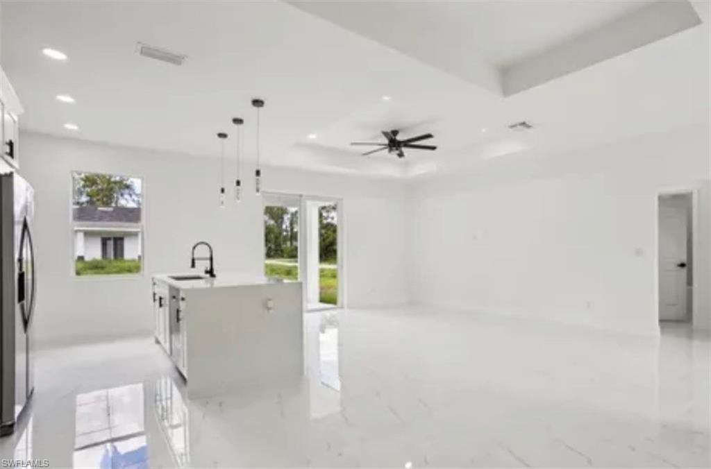 2512 9th Street Southwest Lehigh Acres, FL 33976 - Photo 3 of 10 a view of livingroom with furniture and windows