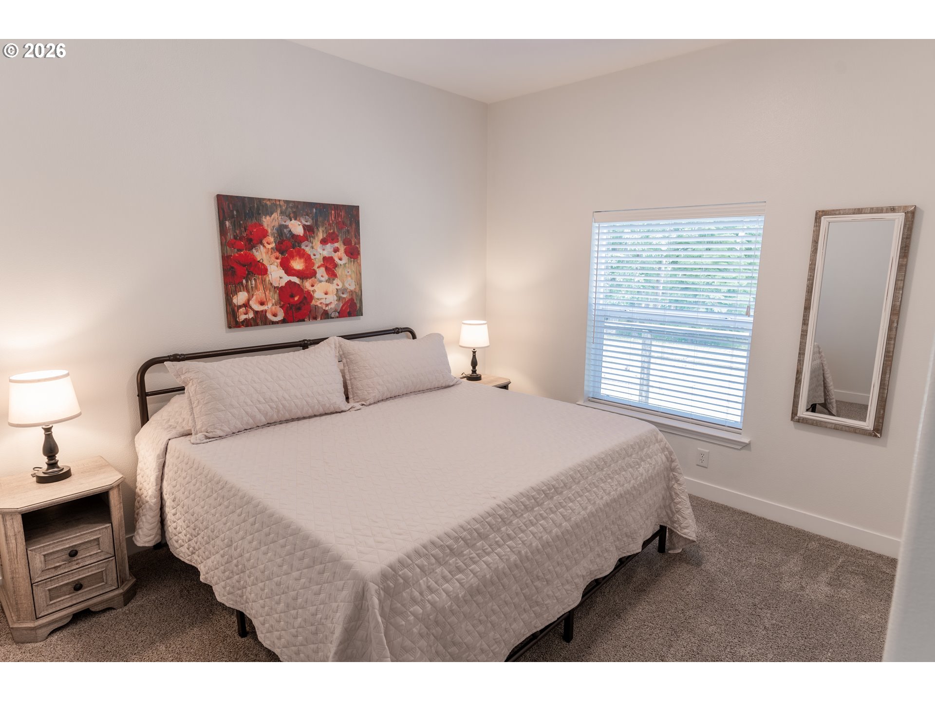 83440 Russell Lane Joseph, OR 97846 - Photo 11 of 19 a bedroom with a bed and a painting on the wall