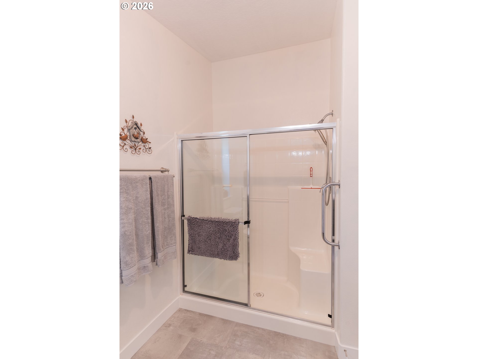 83440 Russell Lane Joseph, OR 97846 - Photo 13 of 19 a bathroom with a glass shower door