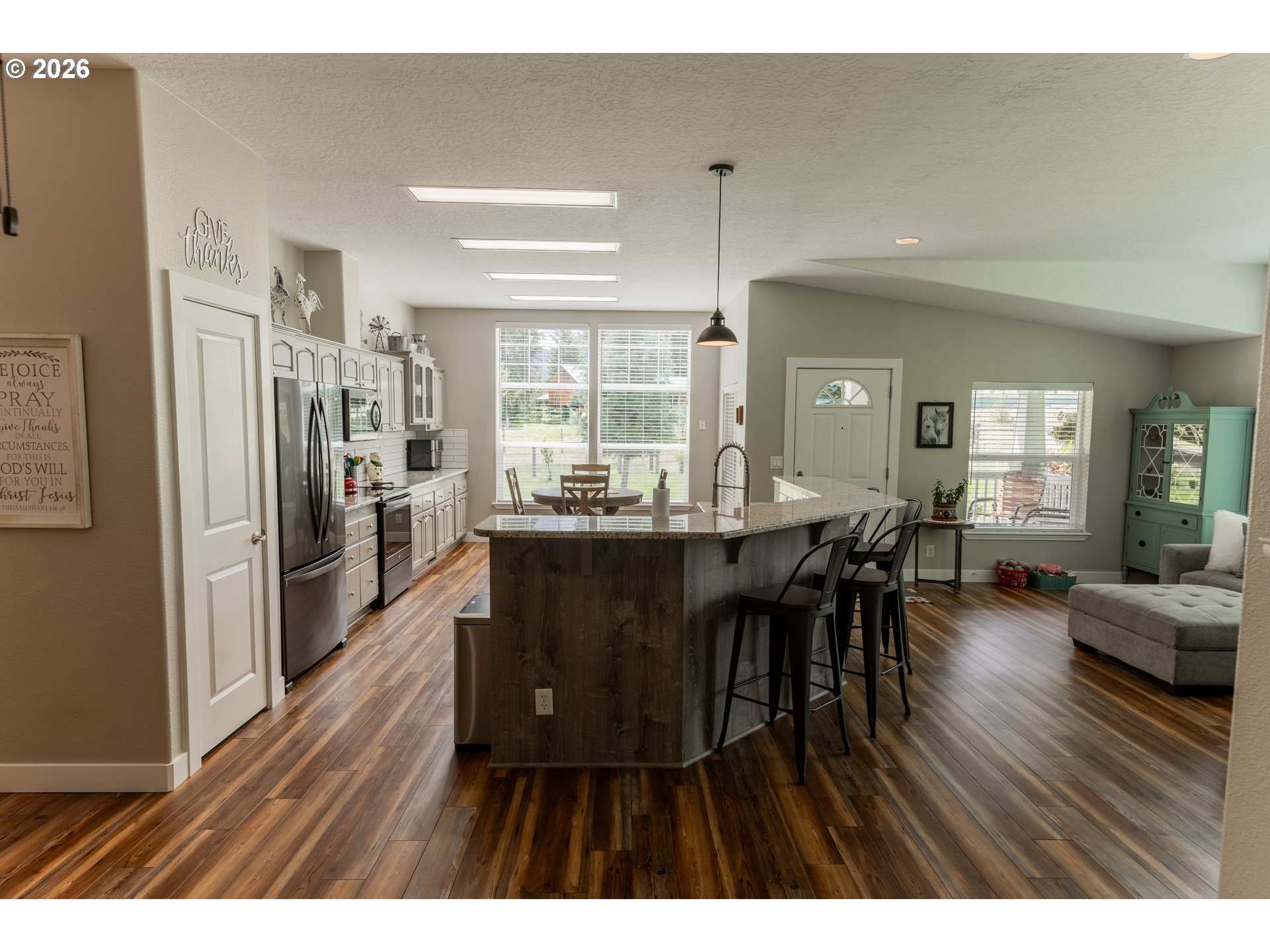 83440 Russell Lane Joseph, OR 97846 - Photo 2 of 19 a dining room with furniture and wooden floor