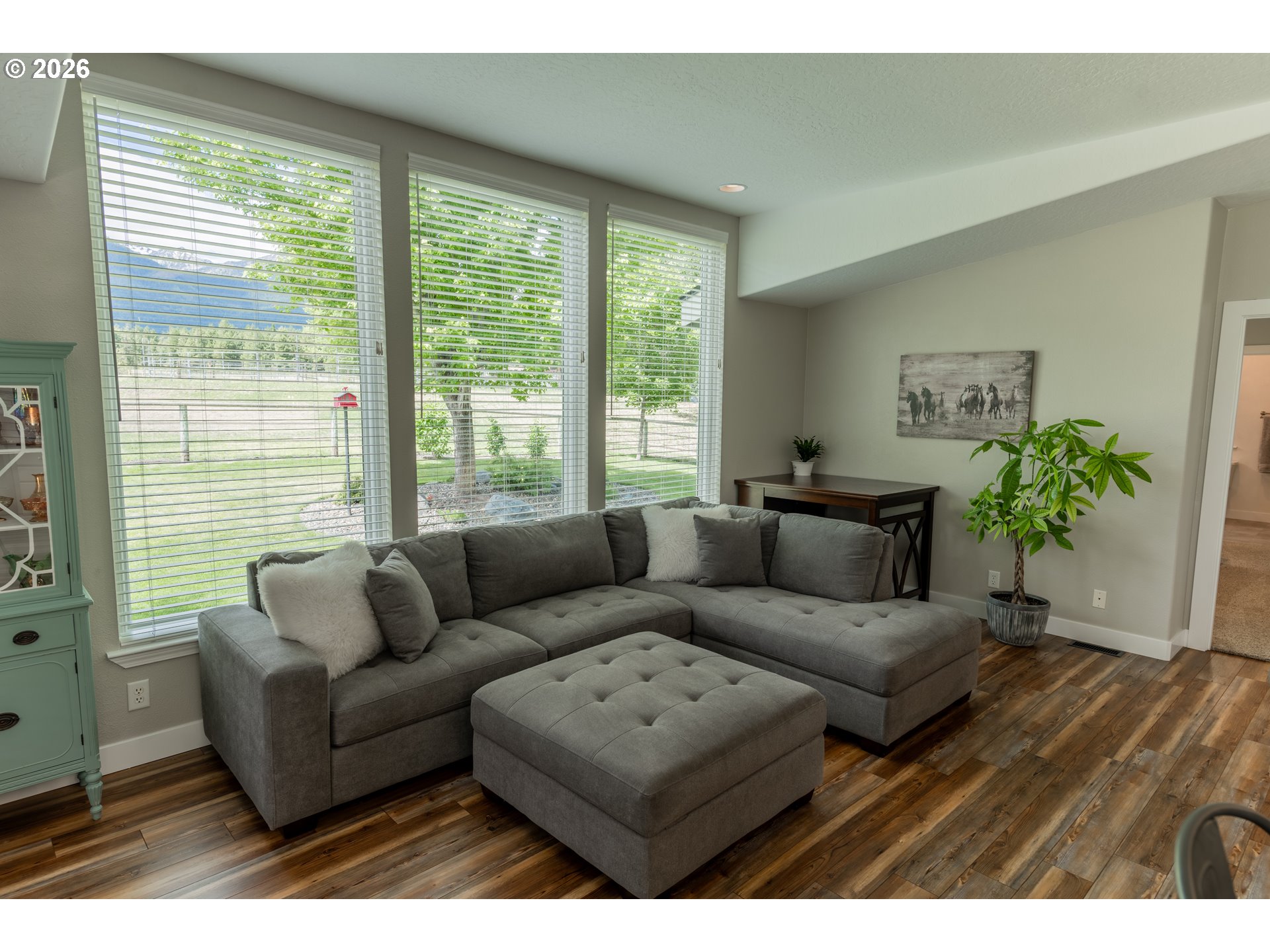 83440 Russell Lane Joseph, OR 97846 - Photo 3 of 19 a living room with furniture and a large window