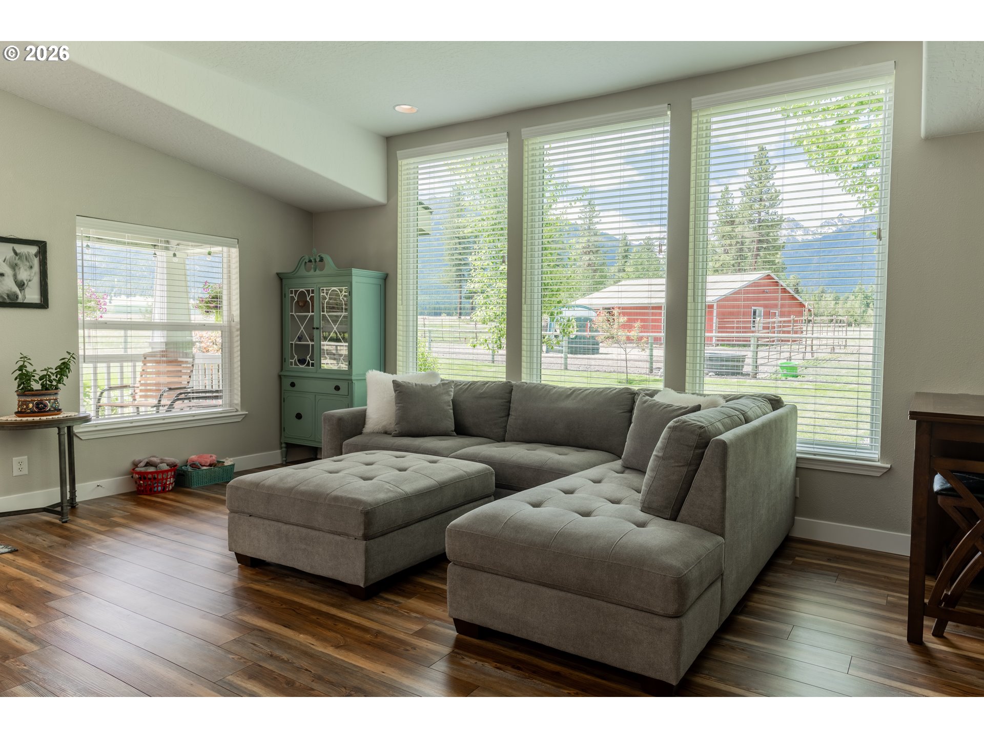 83440 Russell Lane Joseph, OR 97846 - Photo 4 of 19 a living room with furniture and a large window